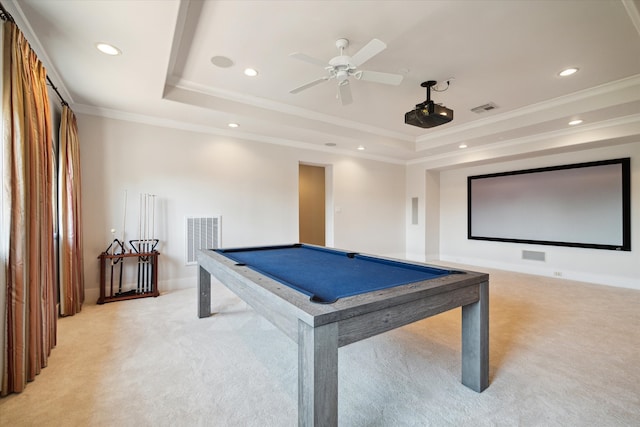 rec room with light carpet, crown molding, a tray ceiling, pool table, and ceiling fan