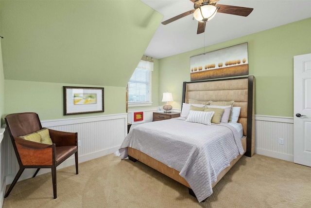 bedroom featuring light carpet and ceiling fan