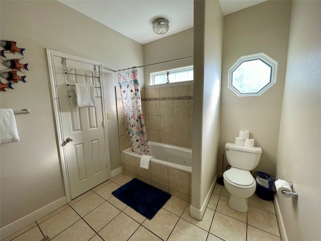 bathroom featuring shower / bathtub combination with curtain, toilet, and tile floors