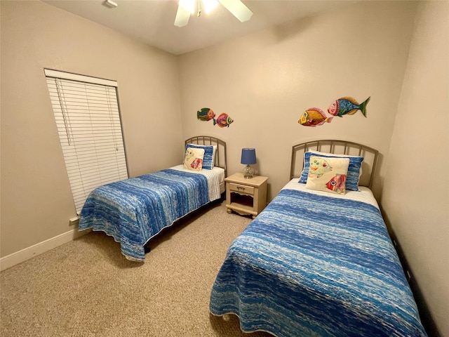 bedroom with ceiling fan and carpet