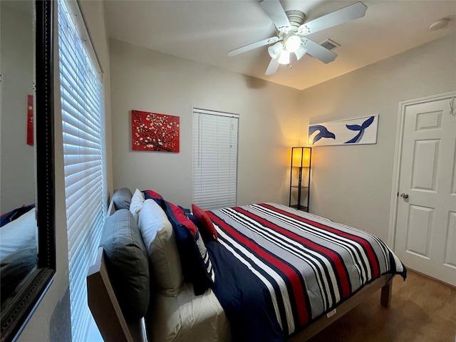 carpeted bedroom featuring ceiling fan