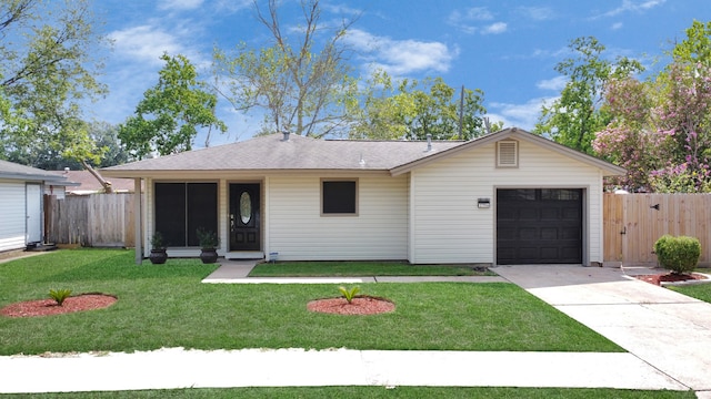 single story home featuring a front lawn