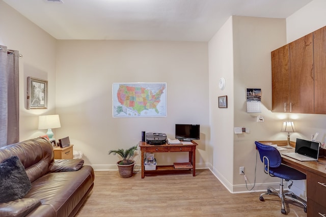 home office featuring light wood-type flooring