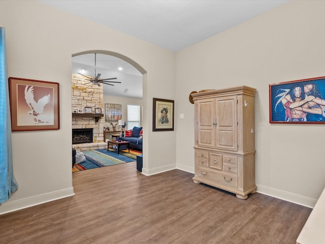 hall with wood-type flooring