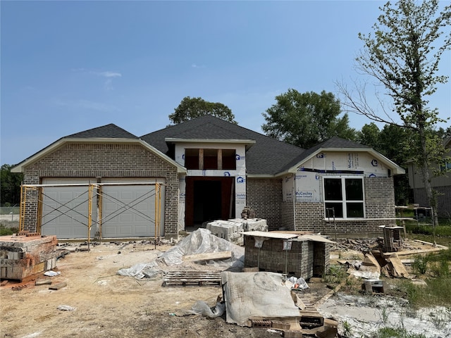 property in mid-construction featuring a garage