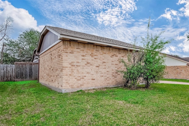 view of property exterior featuring a yard