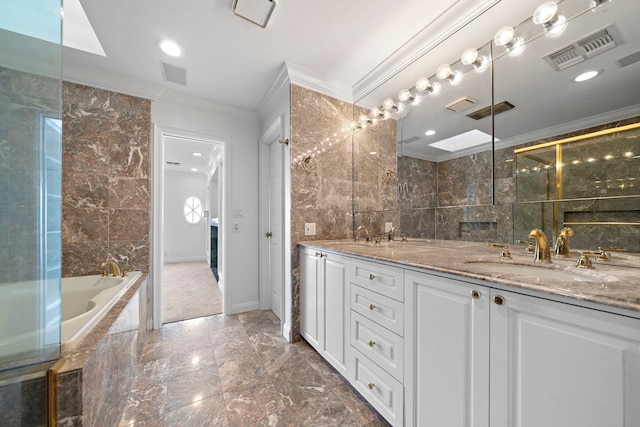 bathroom with tile walls, double sink vanity, crown molding, a relaxing tiled bath, and tile floors