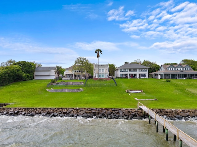 exterior space with a water view