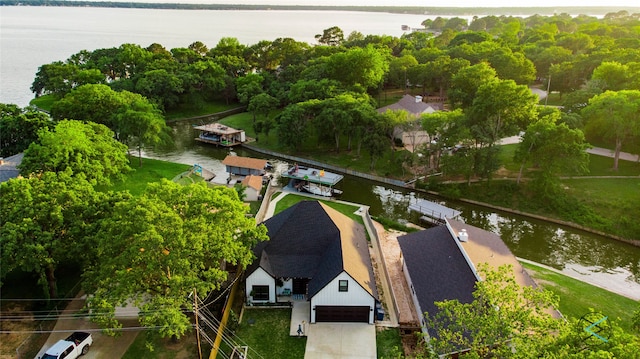 birds eye view of property featuring a water view