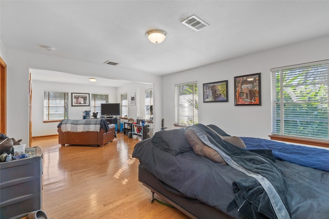 bedroom featuring light wood-type flooring