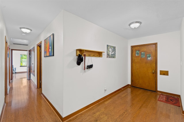 foyer with light wood-type flooring