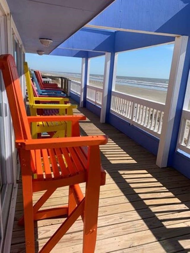 wooden terrace with a water view