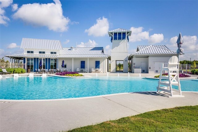 view of pool featuring a patio area