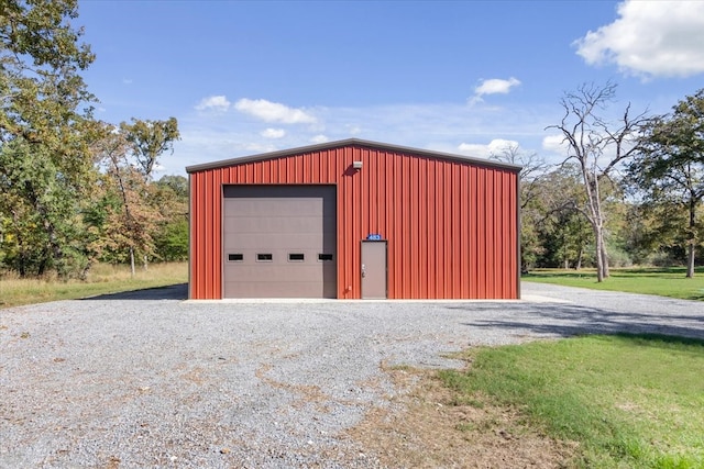 garage with a yard