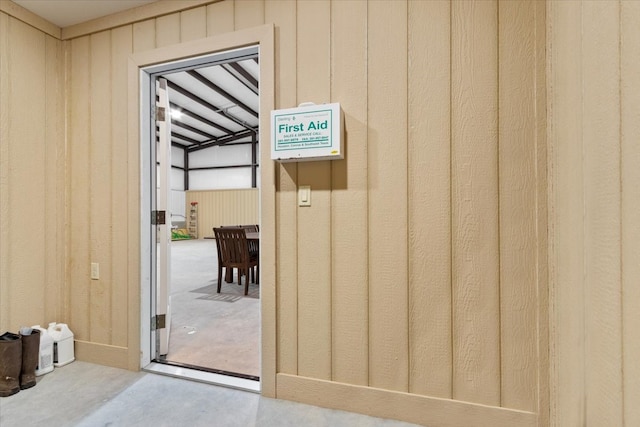 doorway with concrete floors