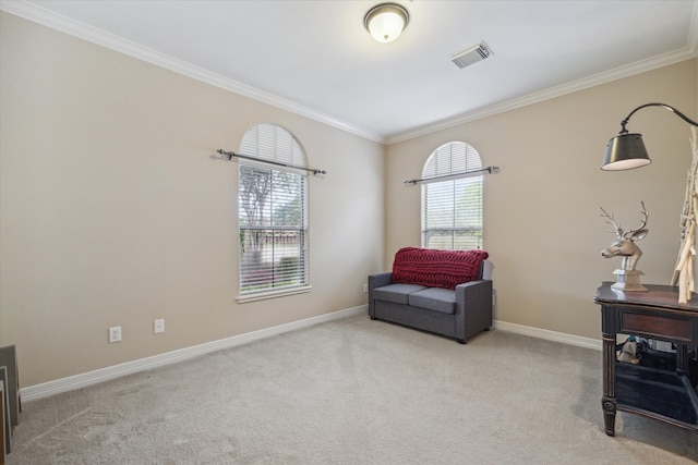 living area with ornamental molding and carpet floors