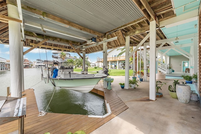 dock area featuring a water view and boat lift