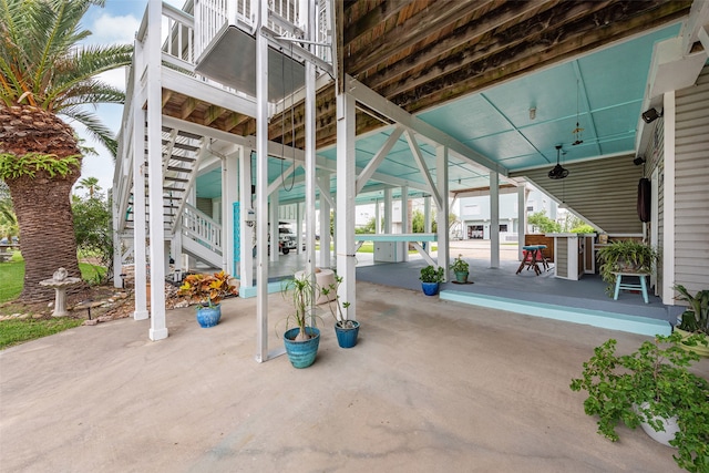 view of patio / terrace featuring stairway