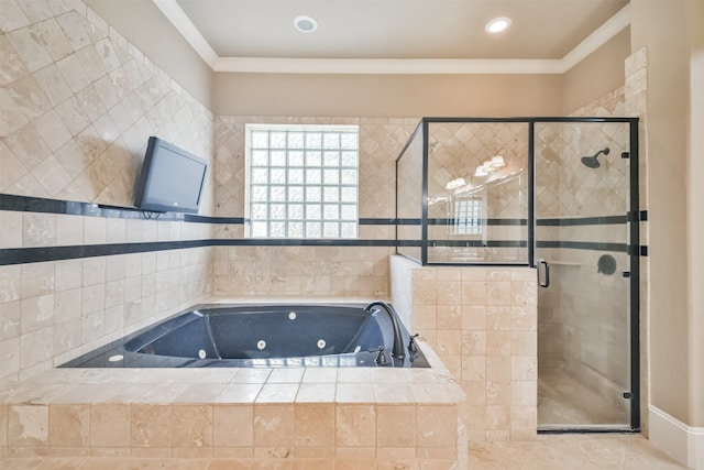 bathroom featuring tile patterned flooring, tile walls, plus walk in shower, and ornamental molding