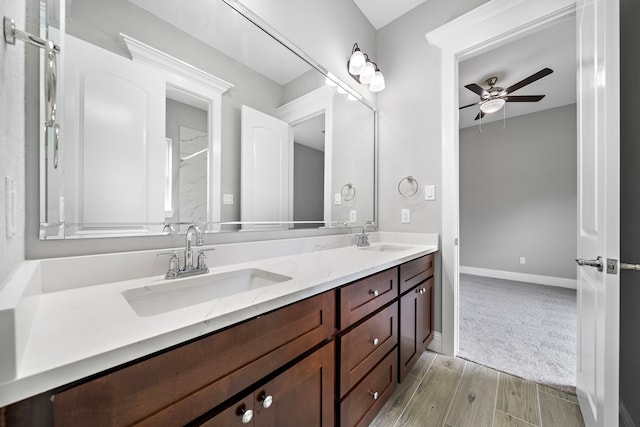 bathroom with vanity and ceiling fan