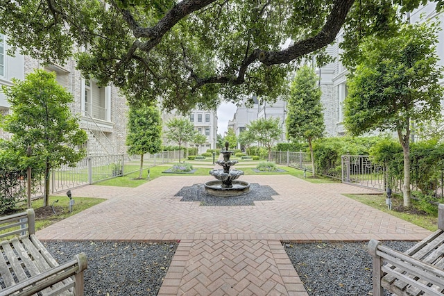 surrounding community featuring a patio area