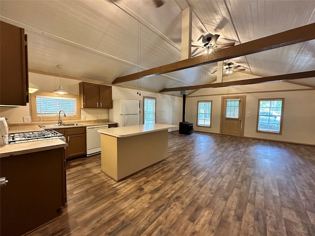 kitchen featuring dark wood-type flooring, lofted ceiling with beams, ceiling fan, and white appliances