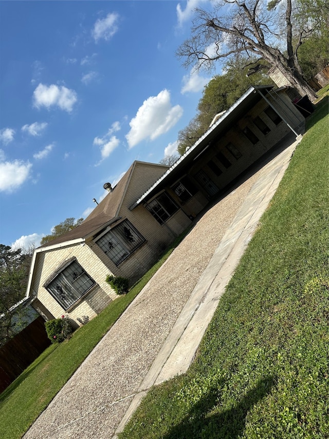 exterior space featuring a yard