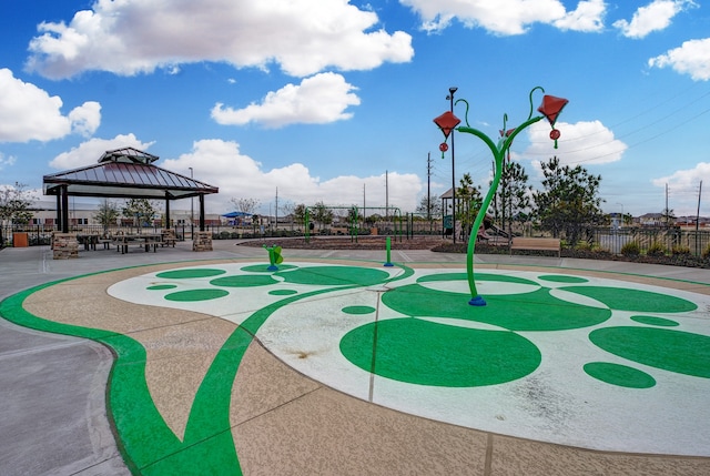 surrounding community with a patio area and a gazebo