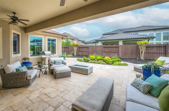 view of patio / terrace featuring an outdoor hangout area, area for grilling, and ceiling fan