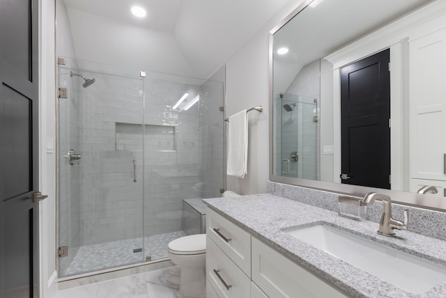 bathroom featuring toilet, lofted ceiling, an enclosed shower, vanity, and tile floors