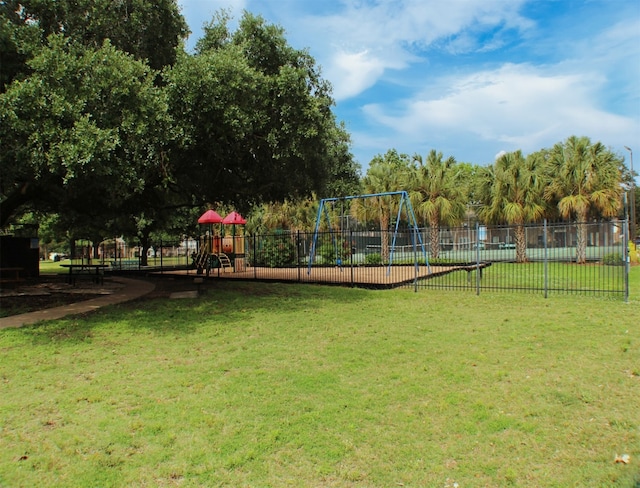 view of nearby features featuring a yard and a playground