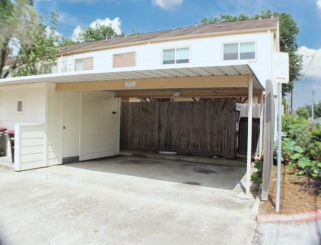 view of front of house featuring a carport