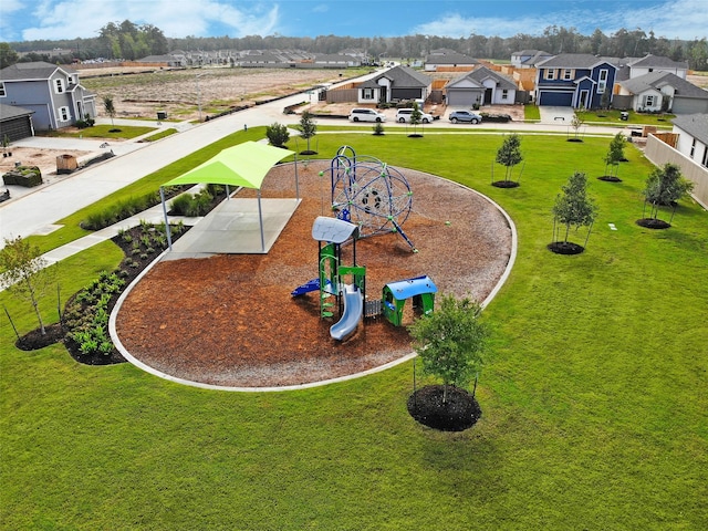 surrounding community with a playground and a lawn