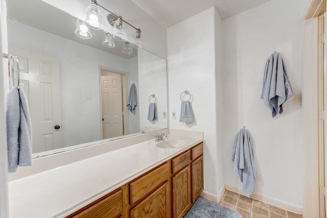 bathroom featuring tile flooring and large vanity