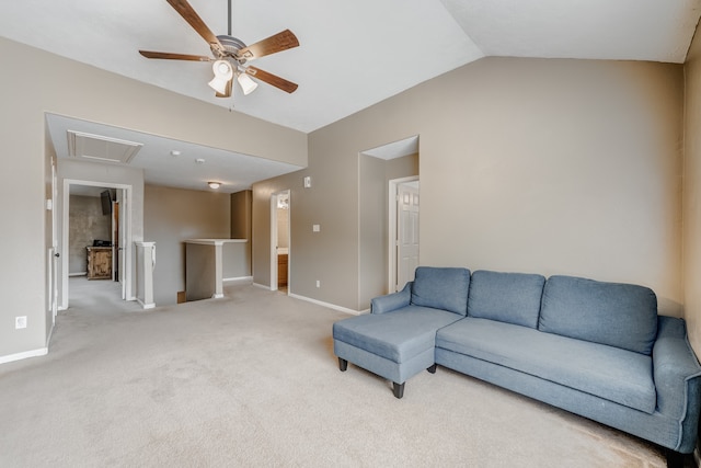 living room featuring lofted ceiling, ceiling fan, and carpet flooring