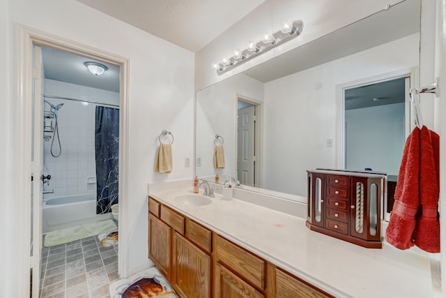 full bathroom with vanity with extensive cabinet space, shower / bath combination with curtain, tile flooring, and toilet