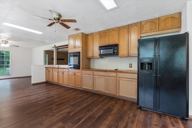 kitchen featuring dark hardwood / wood-style flooring, black appliances, and ceiling fan