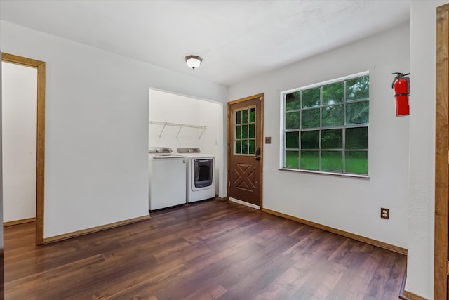 interior space featuring dark hardwood / wood-style flooring and washing machine and dryer