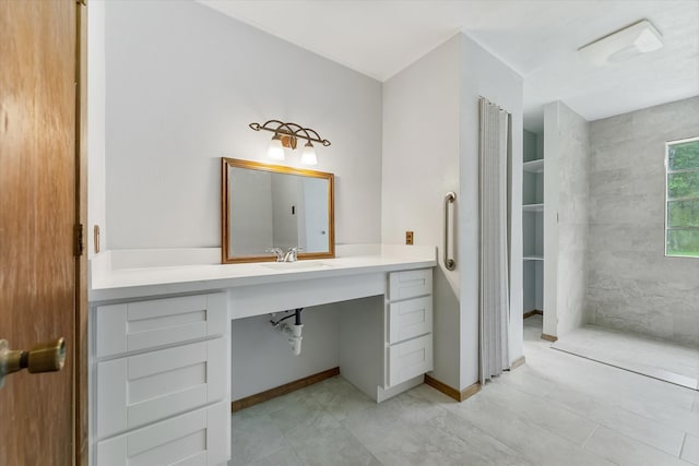 bathroom with vanity and tile floors