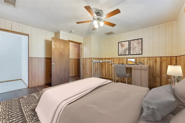 bedroom featuring ceiling fan and wood-type flooring