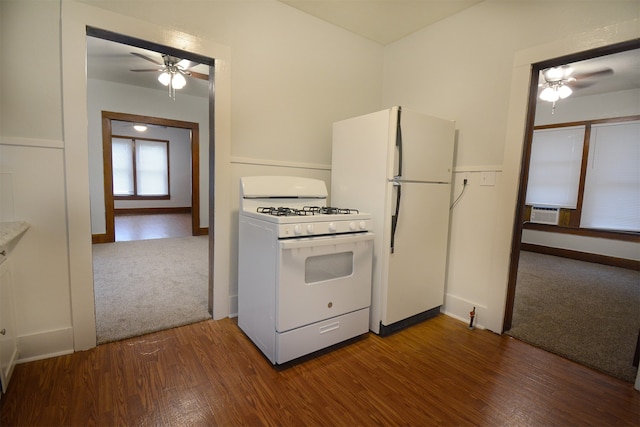 kitchen featuring wood-type flooring, white appliances, and ceiling fan