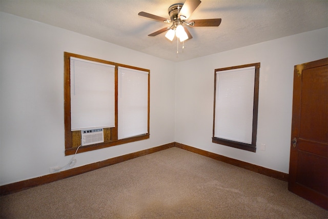 empty room with carpet and ceiling fan