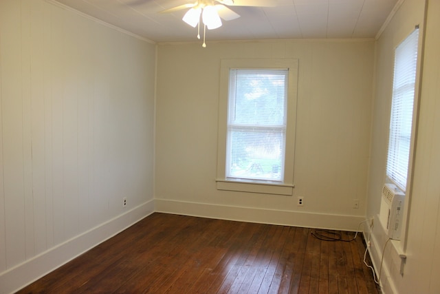 spare room featuring hardwood / wood-style flooring, crown molding, and ceiling fan