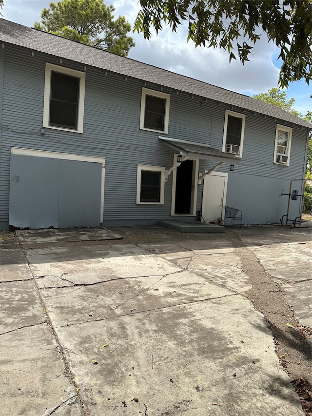 back of property with a patio area