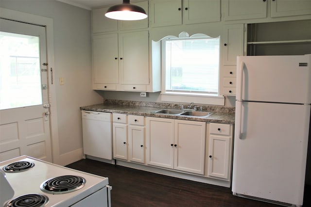 kitchen with white cabinetry, dark hardwood / wood-style flooring, and white appliances