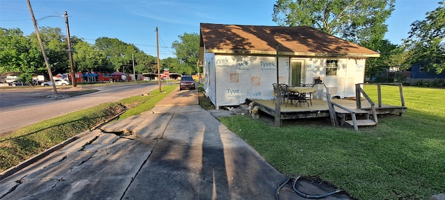 view of outdoor structure with a lawn