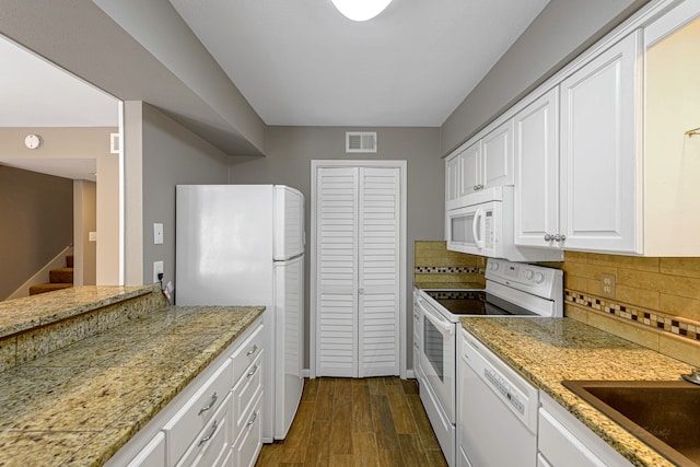 1329 Fountain View Dr Unit 135, Houston, TX 77057 - kitchen featuring white cabinets, white appliances, dark hardwood / wood-style floors, backsplash, and sink