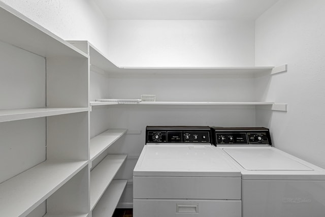 1329 Fountain View Dr Unit 135, Houston, TX 77057 - laundry area featuring independent washer and dryer