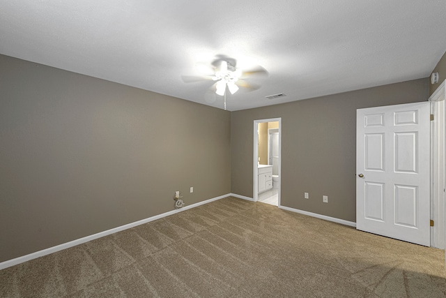 1329 Fountain View Dr Unit 135, Houston, TX 77057 - unfurnished room featuring ceiling fan and carpet