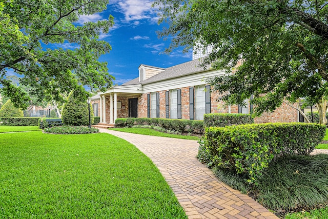 1329 Fountain View Dr Unit 135, Houston, TX 77057 - view of front of property featuring a front yard